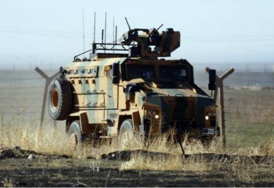 a_turkish_military_armored_vehicle_returns_after_a_patrol_in_occupied_syria_kurdish_region_ap_photo_400