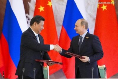 chinas_xi__russias_putin_sign_deal_400 chinas_xi__russias_putin_sign_deal_400