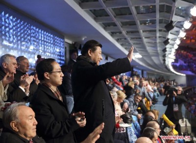 chinas_xi_ping_waves_to_the_national_chinese_delegation_tp_socho_olympic_games_400