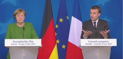 french_president_macron_with_german_chancelor_merkel_points_at_eurofora_project_eurofora_screenshot_from_eu_council_video_400 french_president_macron_with_german_chancelor_merkel_points_at_eurofora_project_eurofora_screenshot_from_eu_council_video_400