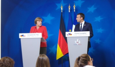 merkel__macron_looks_eurofora_400 merkel__macron_looks_eurofora_400