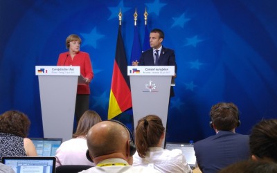 merkel__macron_serious_eurofora_400