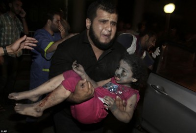 palestinian_carries_injured_girl_400 palestinian_carries_injured_girl_400