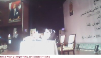 salah_alarouri_speaking_in_turkey_among_ilsamic_religious_officials_under_ataturks_photo_400