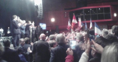 sarkozy_salutes_people_with_flags_400 sarkozy_salutes_people_with_flags_400