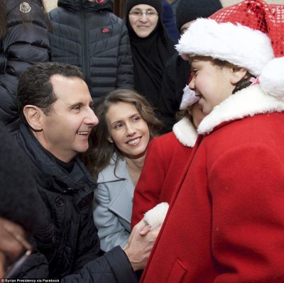 syrian_president_bashar_assad_and_wife_saluting_orphan_children_at_christmas_in_a_convent_400