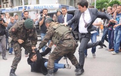 turkish_prime_ministers_counsilor_tramples_underfeet_a_protestor_thrown_t_the_ground_by_2_turkish_soldiers_during_popular_revolts_for_the_death_of_282_minors_at_manisa_b_400