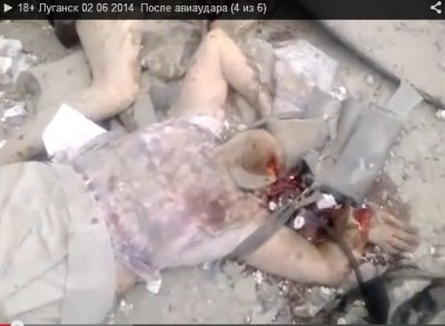 ukran_luhansk_2.6.2014_woman_killed_hand_cut_after_kievs_military_airstrikes_400