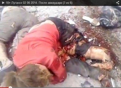 ukran_luhansk_2.6_women_bleeding_leg_cut_killed_after_military_air_strikes_400